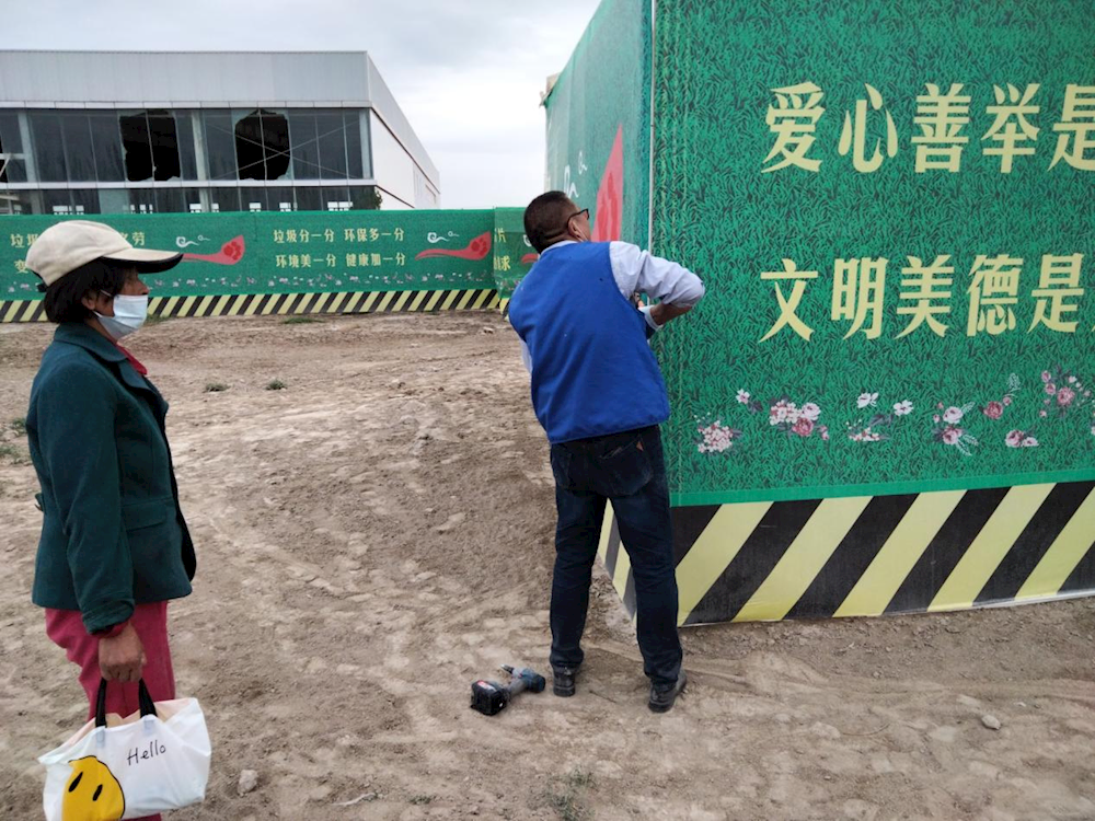 【我為群眾辦實事】扮靚社區我在行 ——南岸社區修復破損圍墻