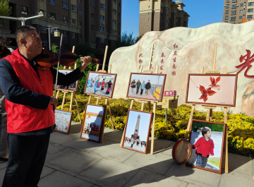 我為群眾辦實事 | “一路書香”流動圖書攝影展進社區